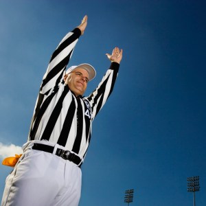 Referee Signaling Score --- Image by © Royalty-Free/Corbis